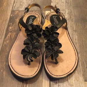 Used.  Sandals w/ adjustable buckle.